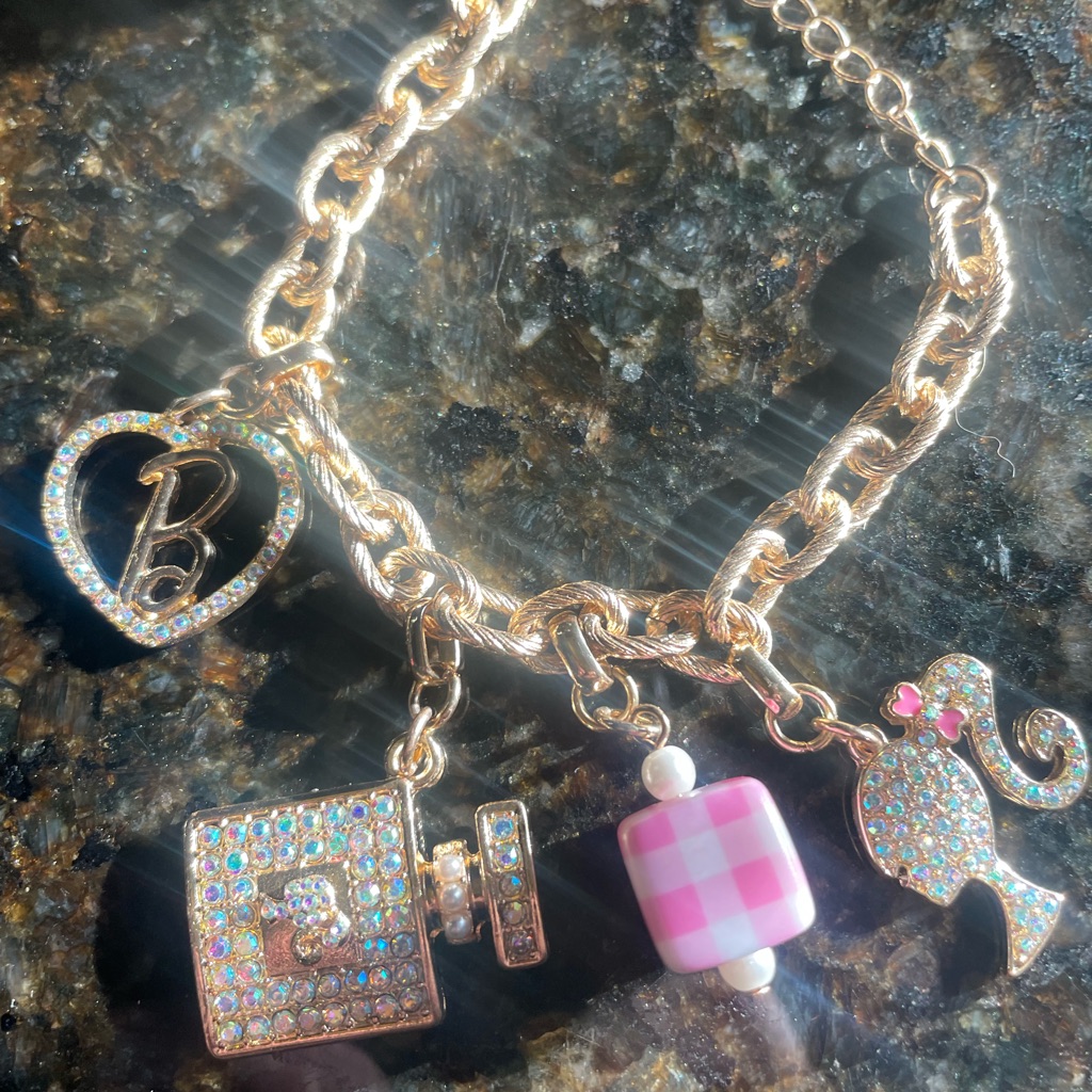 Barbie Charm Bracelet With Pink Accents 26$